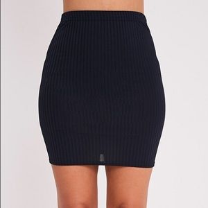 Pretty little thing rubbed navy mini skirt